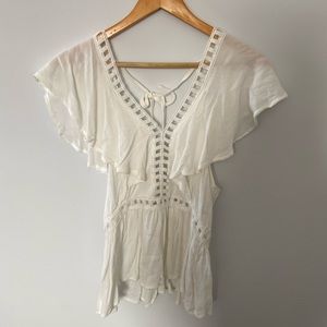 White flowy top